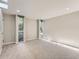 Bright bedroom with two windows and plush carpeting at 1070 Race St # H, Denver, CO 80206