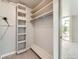 Walk-in closet with built-in shelving and ample storage space at 1070 Race St # H, Denver, CO 80206