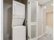Convenient in-unit stacked laundry with storage at 1070 Race St # H, Denver, CO 80206