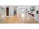 Finished basement with a fireplace, built-in shelving, and walkout access at 4532 Christensen Cir, Littleton, CO 80123