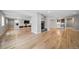 Finished basement with a fireplace, built-in shelving, and wet bar at 4532 Christensen Cir, Littleton, CO 80123