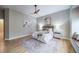 Bright bedroom features a large window seat and a modern ceiling fan at 4532 Christensen Cir, Littleton, CO 80123