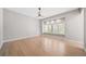 Bedroom features hardwood floors, a ceiling fan, and a window seat at 4532 Christensen Cir, Littleton, CO 80123