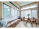 Bright dining nook with a window bench is the perfect spot to start your day with a warm cup of coffee at 4532 Christensen Cir, Littleton, CO 80123