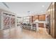 Gourmet kitchen features a large island, stainless steel appliances, and hardwood floors at 4532 Christensen Cir, Littleton, CO 80123