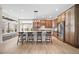 Gourmet kitchen features a large island, stainless steel appliances, and hardwood floors at 4532 Christensen Cir, Littleton, CO 80123