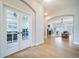 Bright office space with french doors, wainscoting, a modern ceiling fan and plenty of natural light at 4532 Christensen Cir, Littleton, CO 80123