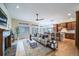 This open floor plan connects the kitchen, dining nook, and living area, offering space for living and entertaining at 4532 Christensen Cir, Littleton, CO 80123