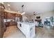The open floor plan connects the kitchen, dining nook, and living room, perfect for living and entertaining at 4532 Christensen Cir, Littleton, CO 80123