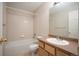 Cozy bathroom featuring a vanity, shower with bathtub and toilet at 9763 E Carolina Pl, Aurora, CO 80247