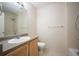 Bright bathroom featuring a shower-tub combo and vanity with sink at 9763 E Carolina Pl, Aurora, CO 80247