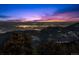 Breathtaking night view overlooking city lights from atop a mountain at 8838 Hillview Rd, Morrison, CO 80465