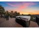 Enjoy scenic views from this deck with a built-in hot tub, perfect for relaxation at 8838 Hillview Rd, Morrison, CO 80465