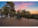 Relax on this deck with stunning mountain views and a charming outdoor seating area at 8838 Hillview Rd, Morrison, CO 80465