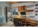 Functional home office featuring built-in storage, a window, and laundry hookups at 8838 Hillview Rd, Morrison, CO 80465