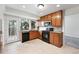 Well-equipped kitchen featuring granite countertops, stainless steel appliances, and a bright window at 2495 S Lansing Way, Aurora, CO 80014