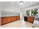 Modern kitchen featuring granite countertops, stainless steel appliances, and ample cabinet space at 2495 S Lansing Way, Aurora, CO 80014