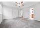 Bright main bedroom features carpet, two large closets and access to the main bathroom at 2495 S Lansing Way, Aurora, CO 80014