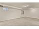 Finished basement with neutral carpeting and window at 5428 W 115Th Dr, Westminster, CO 80020