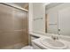 Bathroom featuring a frosted glass sliding shower door and sink with mirror at 5428 W 115Th Dr, Westminster, CO 80020