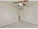 Bedroom with a ceiling fan and carpeted floor; closet for storage at 5428 W 115Th Dr, Westminster, CO 80020