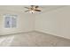 Bright bedroom with ceiling fan and plush carpeting at 5428 W 115Th Dr, Westminster, CO 80020