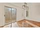 Bright dining area with hardwood floors and sliding glass door at 5428 W 115Th Dr, Westminster, CO 80020