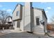 Two-story home featuring horizontal siding, concrete patio, and manicured gravel landscaping at 5428 W 115Th Dr, Westminster, CO 80020