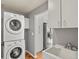 Laundry room with washer, dryer, and utility sink at 5428 W 115Th Dr, Westminster, CO 80020