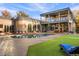 Luxury home featuring a private pool, patio area, and manicured backyard lawn at 9 Sedgwick Dr, Englewood, CO 80113