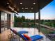 Relax on this private balcony with outdoor seating, scenic views, and a serene atmosphere at 9 Sedgwick Dr, Englewood, CO 80113