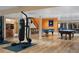 Spacious finished basement includes a gym area, pool table, and ample room for entertainment at 9 Sedgwick Dr, Englewood, CO 80113