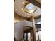 Foyer with a unique skylight, curved walls, and elegant details, creating a bright and luxurious atmosphere at 9 Sedgwick Dr, Englewood, CO 80113