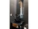 Stylish powder room features a sleek black vessel sink and modern fixtures at 9 Sedgwick Dr, Englewood, CO 80113