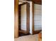 A detailed look at the custom wood built-ins adds storage and visual interest at 9 Sedgwick Dr, Englewood, CO 80113