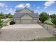Three car garage with plenty of parking space in front of the house at 5605 Killen Ave, Castle Rock, CO 80104