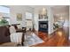 Cozy living room with a fireplace and hardwood floors at 5605 Killen Ave, Castle Rock, CO 80104