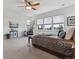 Serene main bedroom with plush carpet, great light, and elegant furnishings at 5605 Killen Ave, Castle Rock, CO 80104
