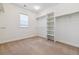 Organized walk-in closet with shelving and hanging space for storage at 5605 Killen Ave, Castle Rock, CO 80104