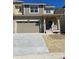 Charming two-story home showcasing stone accents, neutral paint and a two-car garage at 6739 Juniper Dr, Thornton, CO 80602
