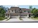 Charming duplex with attached garages and professionally landscaped front lawns at 6739 Juniper Dr, Thornton, CO 80602