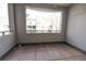 A beautiful outdoor balcony with tile flooring and an open view of the complex at 451 S Reed St, Lakewood, CO 80226