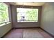 Cozy balcony with string lights and scenic treetop views, a perfect relaxation spot at 451 S Reed St, Lakewood, CO 80226