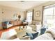 Inviting living room featuring a ceiling fan, hardwood floors, lots of seating and natural light at 451 S Reed St, Lakewood, CO 80226