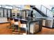 Spacious kitchen features a large center island with seating, modern appliances, and a sleek design at 421 Dexter St, Denver, CO 80220