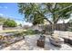Backyard patio area featuring a firepit and comfortable seating for outdoor relaxation at 4844 E 110Th Pl, Thornton, CO 80233