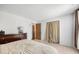 Serene bedroom with dresser, closet, and calm atmosphere at 4844 E 110Th Pl, Thornton, CO 80233