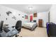 Bedroom with gaming decor, spacious layout, and comfortable bed at 4844 E 110Th Pl, Thornton, CO 80233