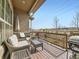 Relaxing back deck area with outdoor furniture and open views of the surrounding community at 4420 White Rock Dr, Broomfield, CO 80023