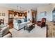 Open concept living area flows seamlessly into the dining and kitchen, perfect for entertaining at 4420 White Rock Dr, Broomfield, CO 80023